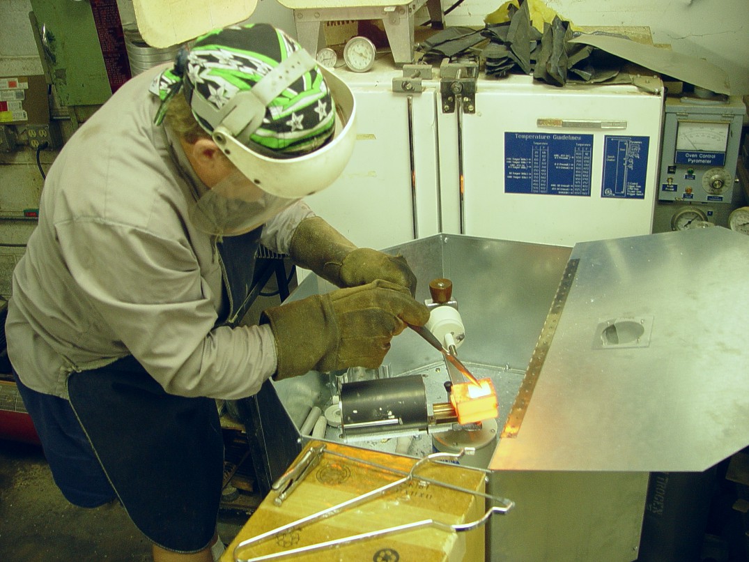 Hand-centrifugal casting of bronze guard and sword pommel