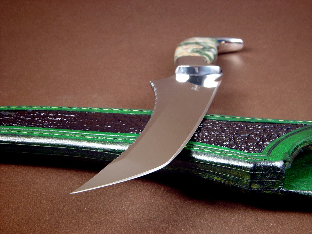 "Dagon" fillet, boning, carving, chef's, collector's knife, obverse side view in 440C high chromium stainless steel blade, 304 stainless steel bolsters, Green Orbicular Jasper gemstone handle, frog skin inlaid in hand-carved leather sheath