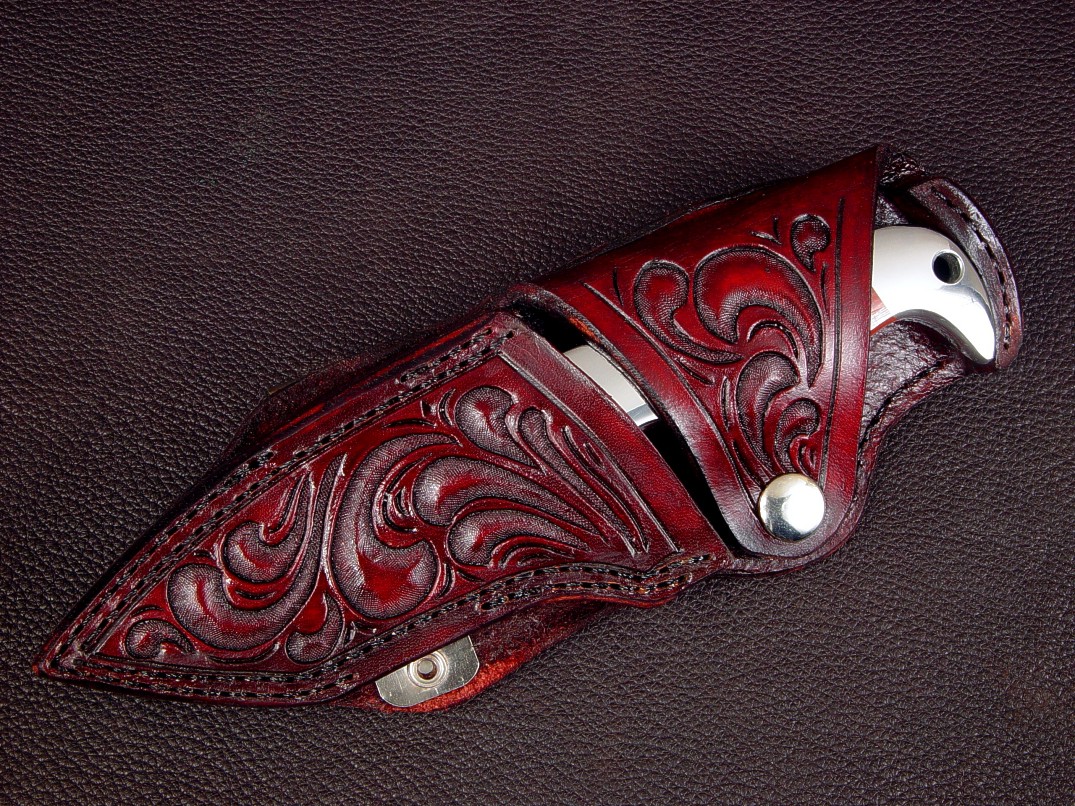 "Last Chance Light," sheath view in 440C high chromium stainless steel blade, 304 stainless steel bolsters, Australian Snakeskin Jasper gemstone handle, hand-carved leather horizontal belt sheath