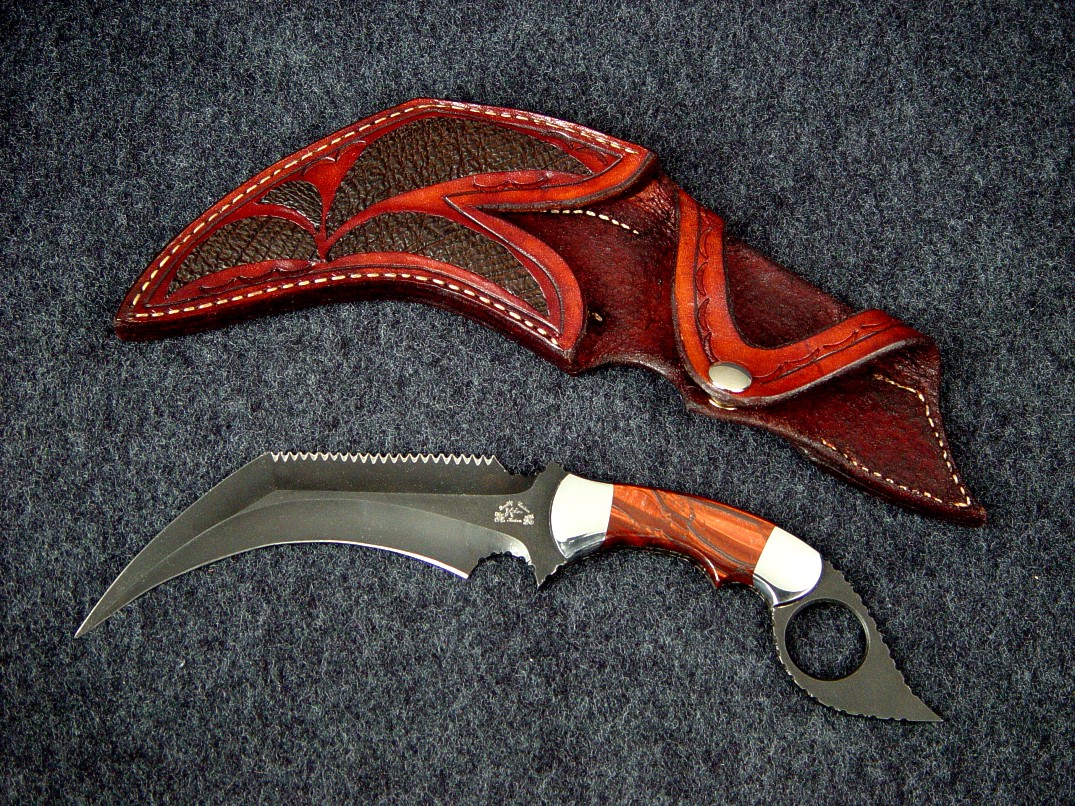 "Triton" in blued O-1 tool steel blade, carbon steel bolsters, Red Tigereye Quartz gemstone handle, Cape Buffalo skin inlaid in hand-carved leather sheath