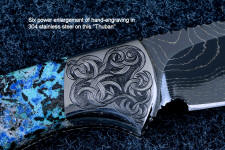 "Thuban" obverse side view in hot-blued 1095/nickel damascus blade, hand-engraved 304 stainless steel bolsters, Shattuckite gemstone handle, hand-carved, hand-dyed leather sheath