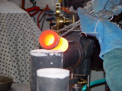 Casting molten bronze for "Aegir" prehistoric nautilus art sculpture