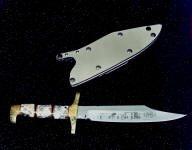 "Alamo" Bowie Knife, commemorative, in etched 440C high chromium stainless steel blade, hand-engraved brass fittings, quartz with pyrite gemstone, ebony, brass, red fiber spacer handle, locking kydex, aluminum, stainless steel sheath