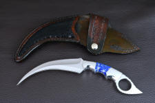 "Raptor" obverse side view in CPM154CM powder metal technology high molybdenum stainless steel blade, 304 stainless steel bolsters, Peruvian Lapis Lazuli gemstone handle, hand-carved leather sheath inlaid with Caiman skin