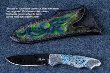 "Thuban" obverse side view in hot-blued 1095/nickel damascus blade, hand-engraved 304 stainless steel bolsters, Shattuckite gemstone handle, hand-carved, hand-dyed leather sheath